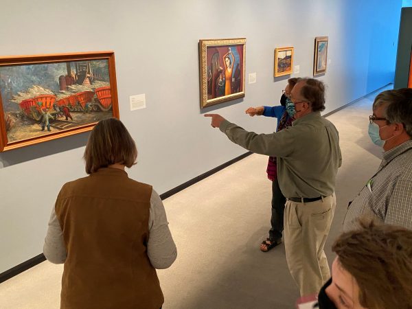 Interior view of the galleries with docents in masks