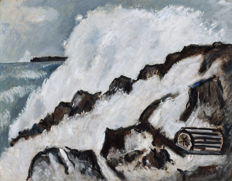 A coast line with strong waves bursting on rocks and a lobster pot.
