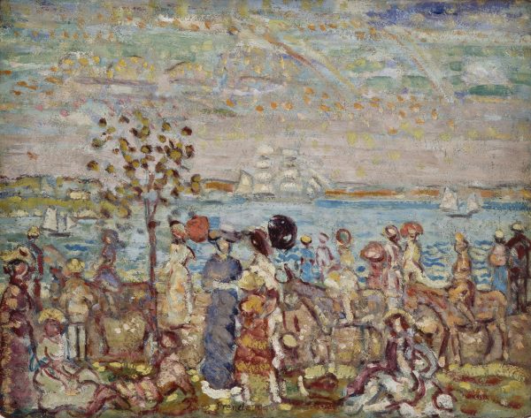 A scene of a crowd in a park with water and boats in the background.