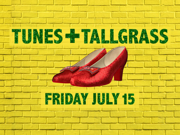 Glittery red slippers with a bow centered on a yellow brick background and emereld green text reading Tunes + Tallgrass, Friday July 15