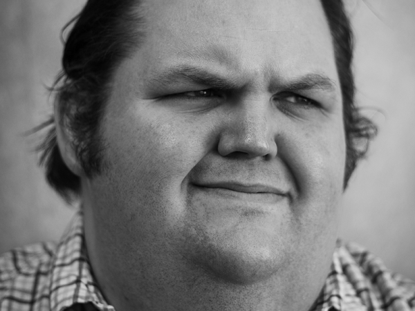 Close up, black and white headshot of Daniel Pewewardy
